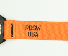 Load image into Gallery viewer, Remove Before Flight - Orange/Black Elastic Watch Band
